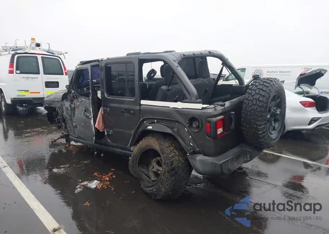 2022 Jeep Wrangler Unlimited Willys Sport 4X4 z USA, uszkodzony, nr VIN 1C4HJXDG9NW215798